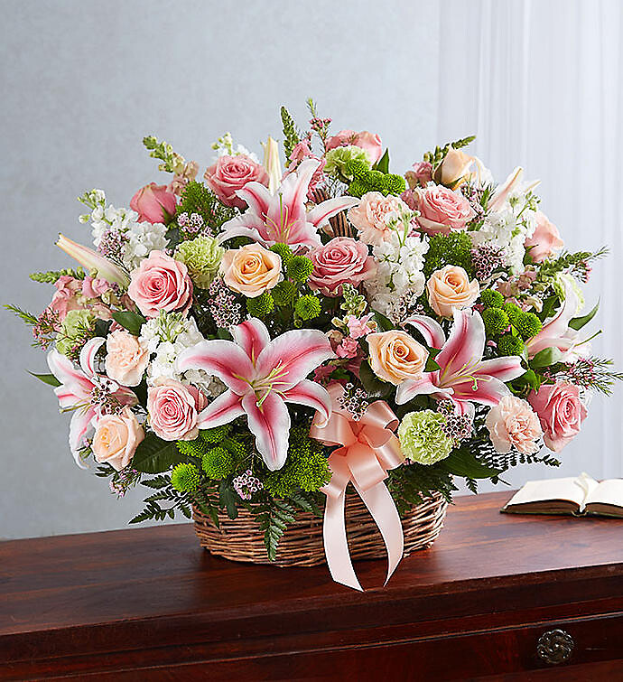 Pastel Sympathy Basket Arrangement arranged by a florist in